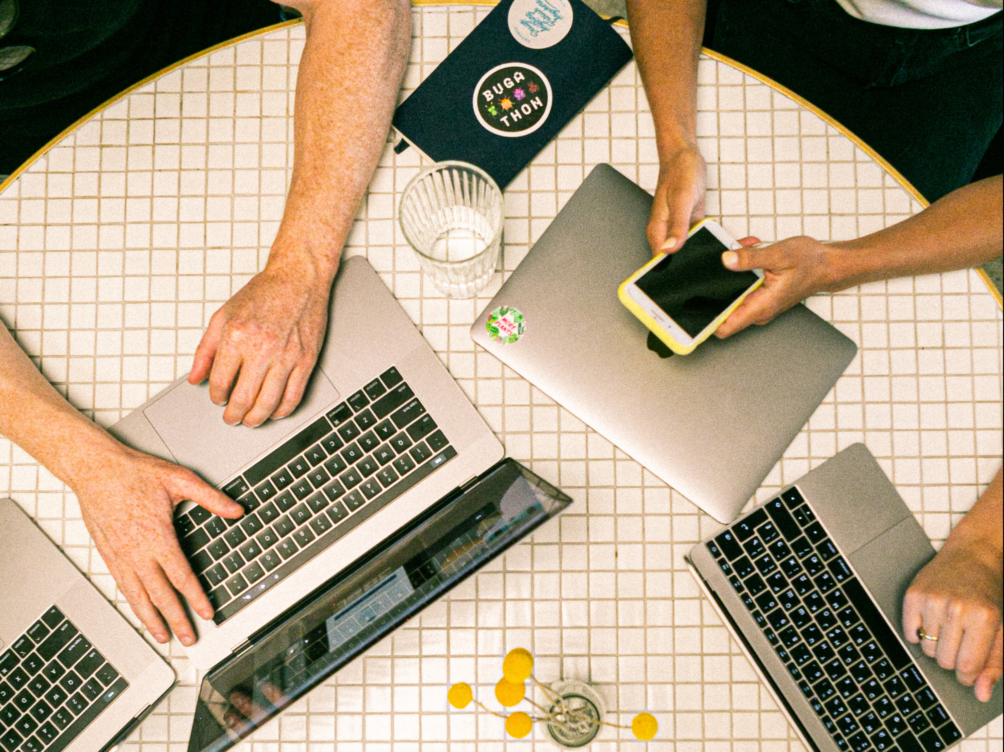 Tech Helpdesk Team accessing laptop